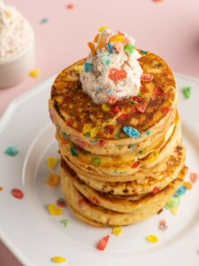 Fruity Pebbles Pancakes Stacked on a Plate