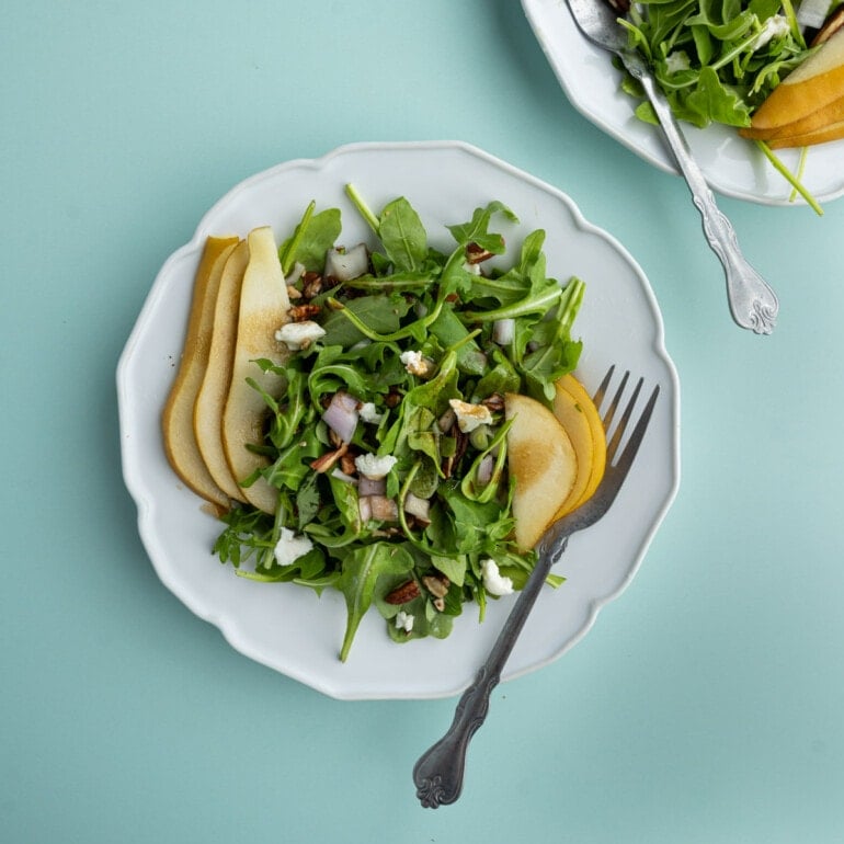 Overhead shot of plated Arugula Pear Salad