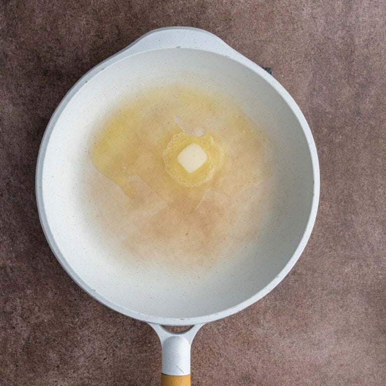 Butter melting in a pan and heating up