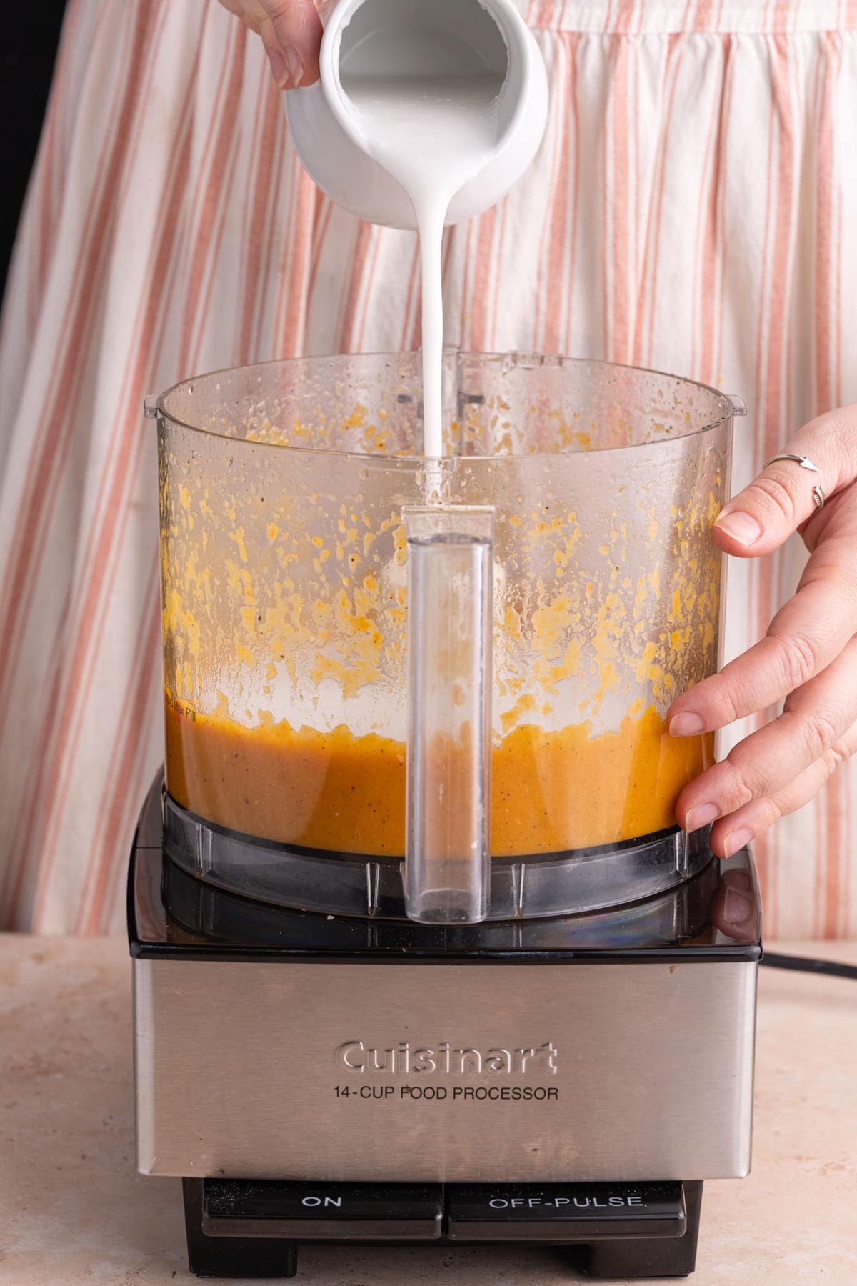 Adding coconut milk to carrot pasta sauce