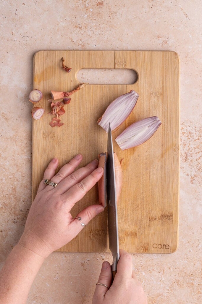 Slicing shallots in half lengthwise