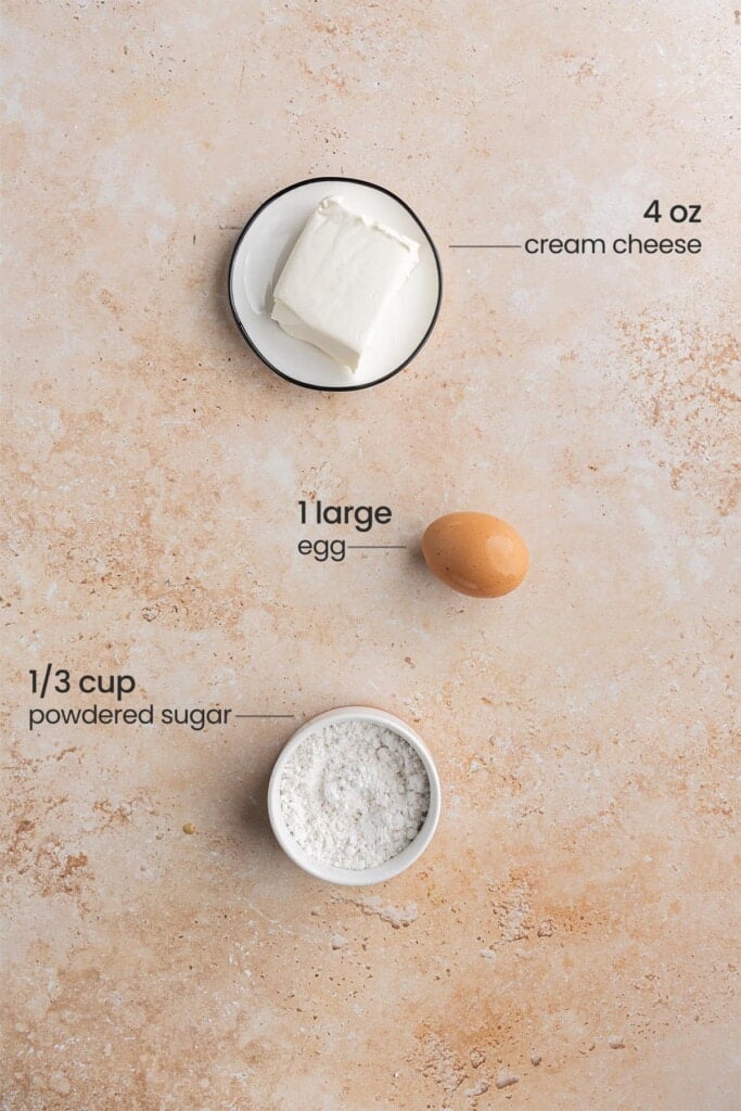 Ingredients for cream cheese layer in the banana bread - cream cheese, egg, powdered sugar.