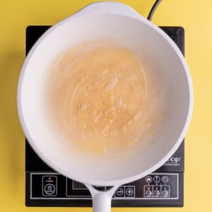 Butter melted and hot in a pan