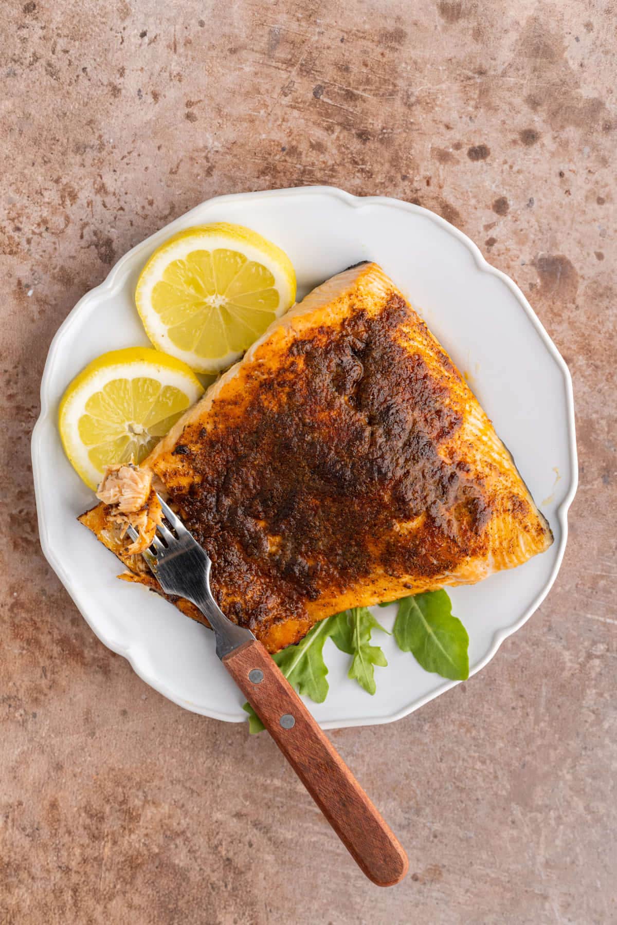 Salmon with Old Bay Seasoning and a fork