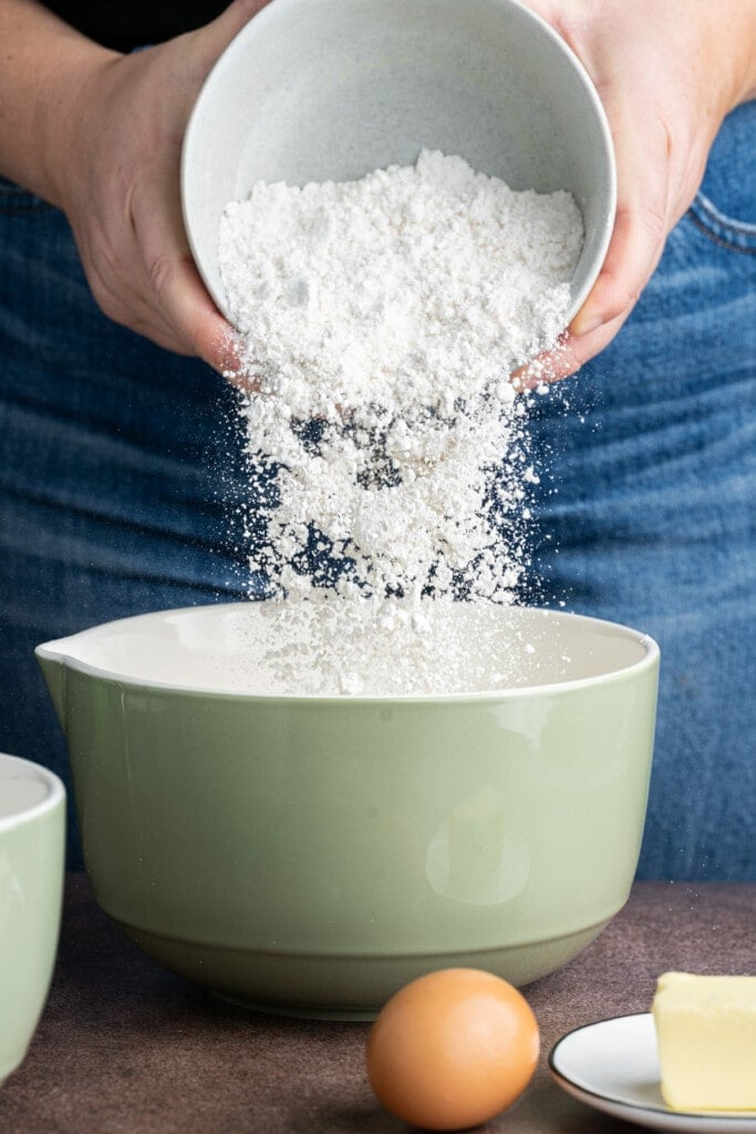 Adding dry ingredients to mini pancake batter