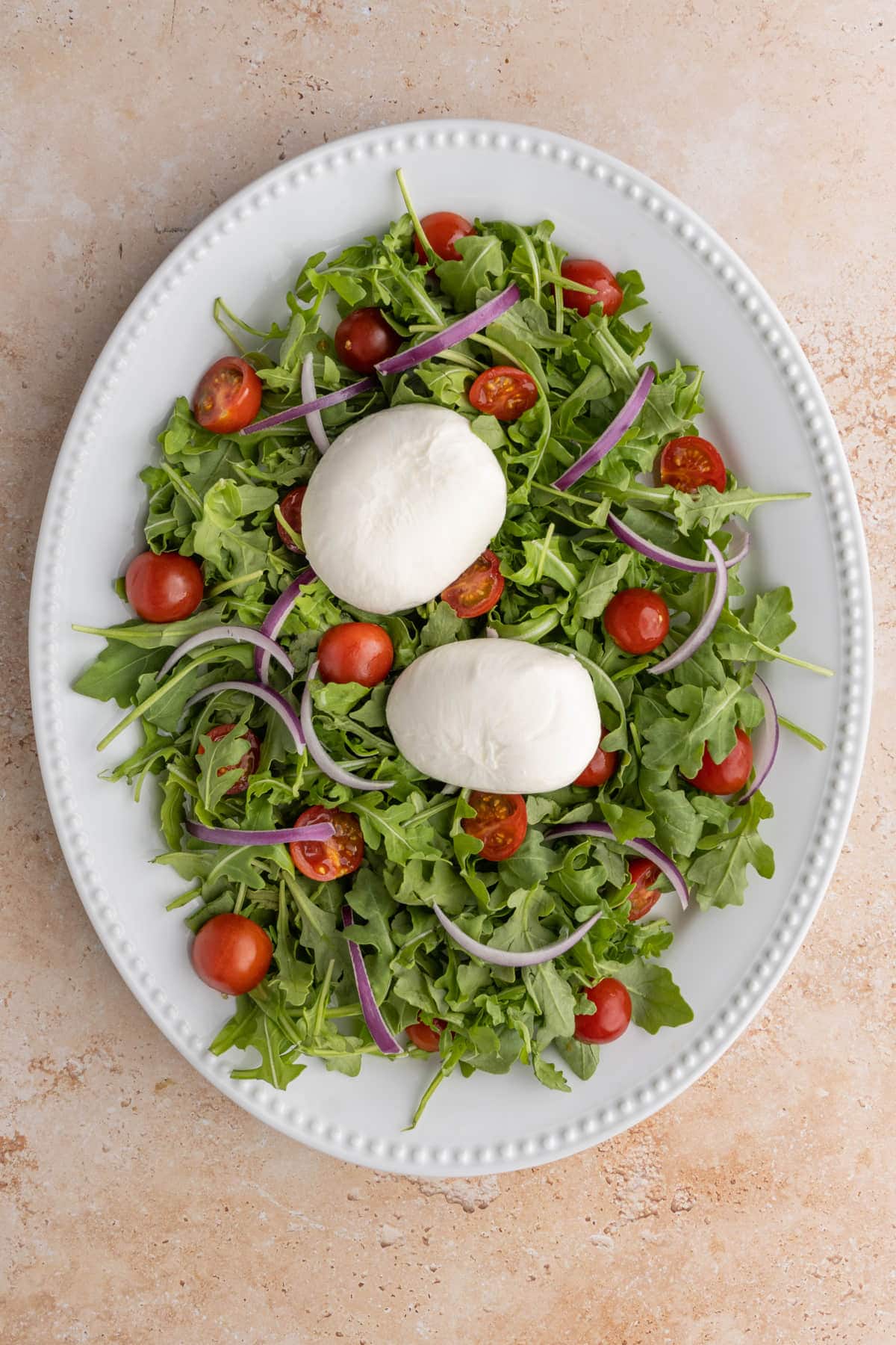 Arugula Burrata Salad before dressing