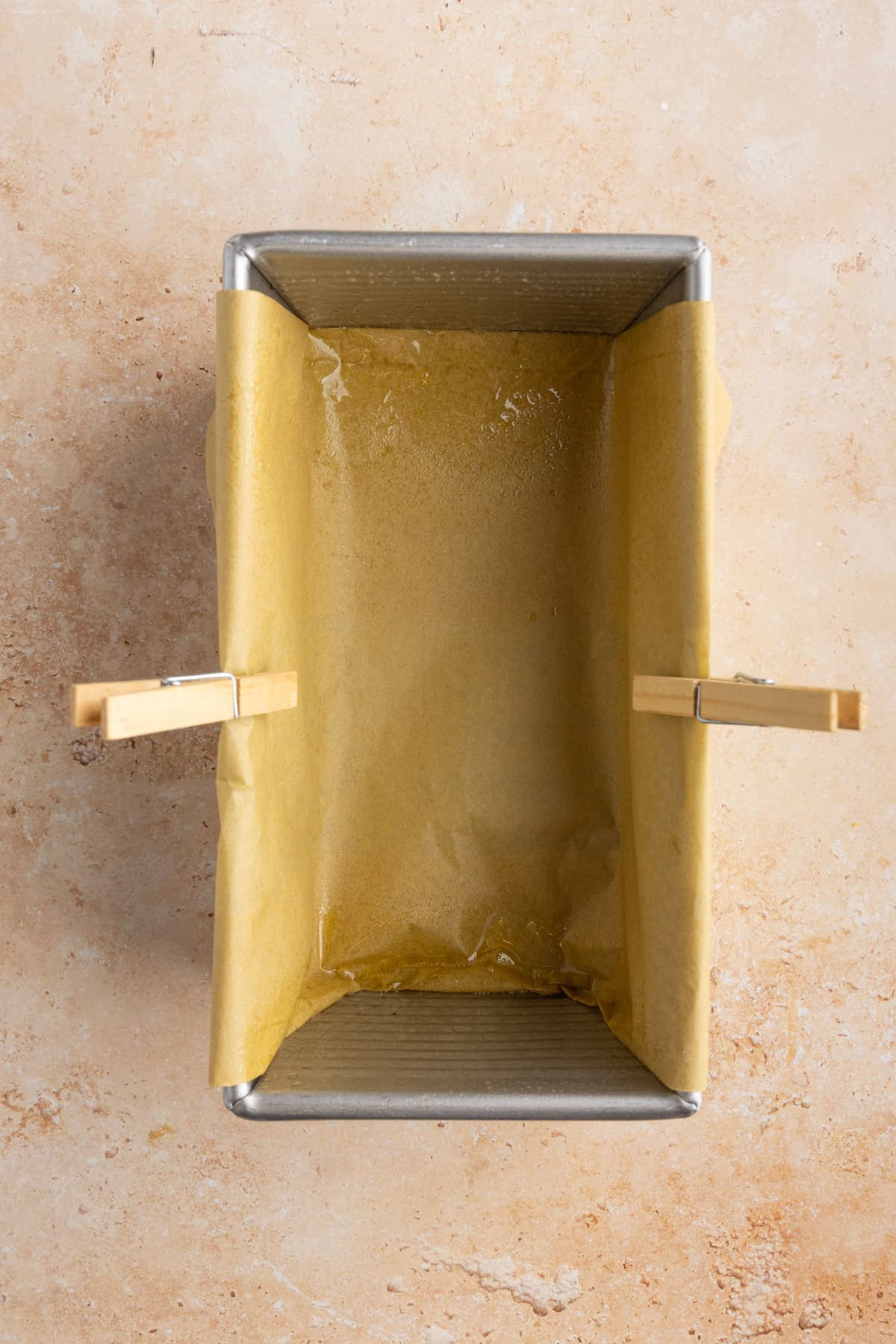 Loaf pan lined with parchment paper