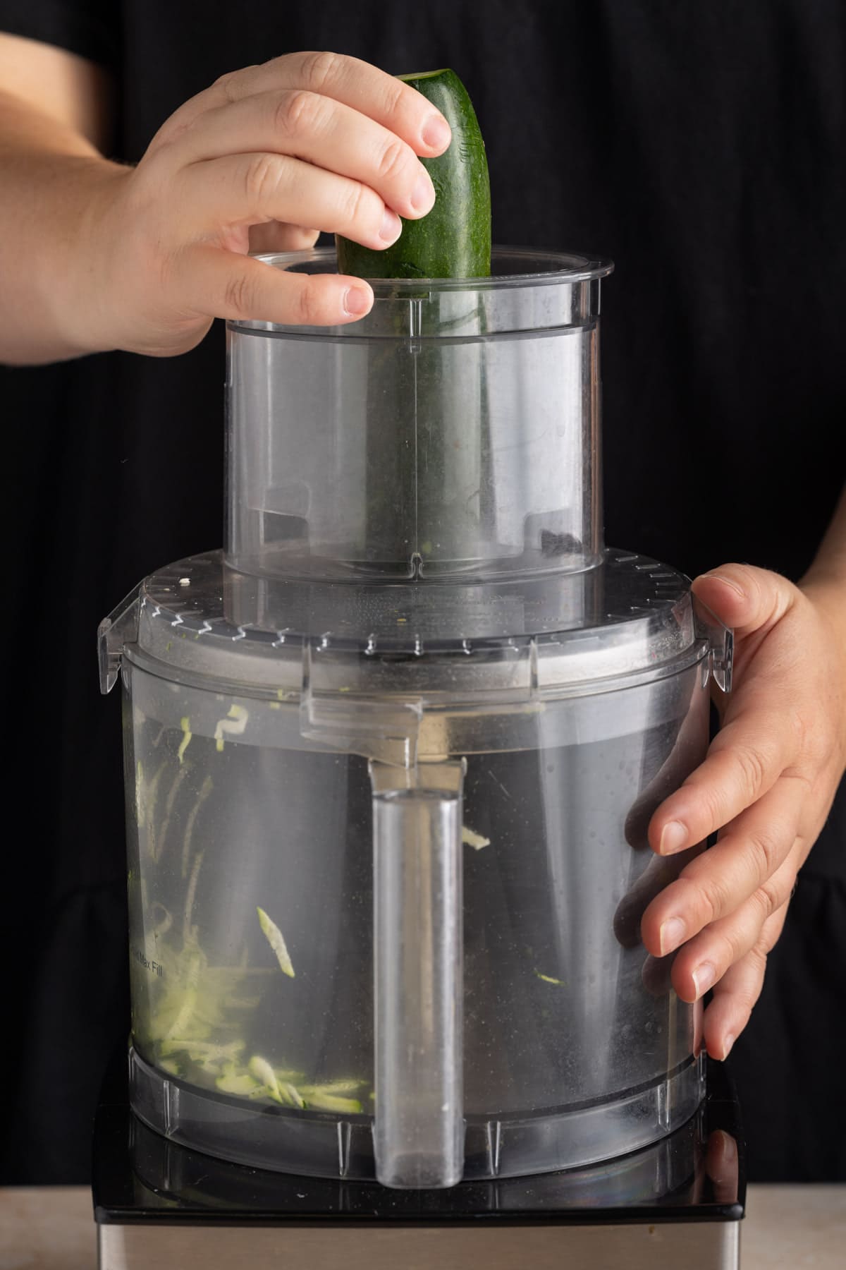 Using a food processor to shred zucchini