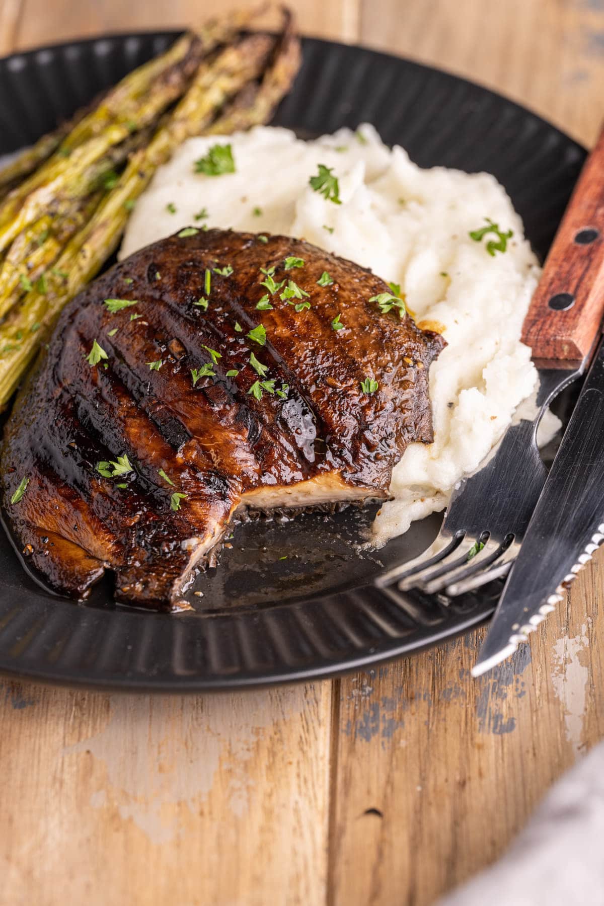 Portobello Mushroom Steak with forkful taken out