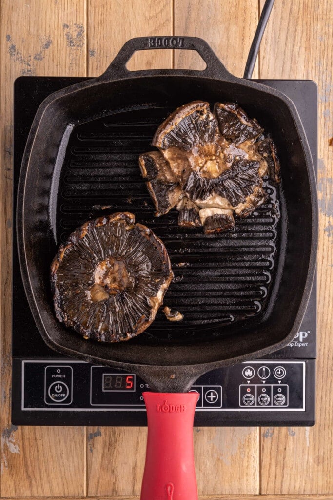 Grilling second side of mushrooms in grill pan