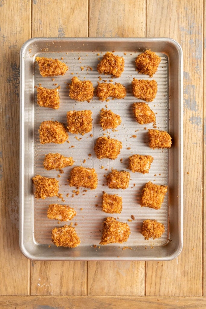 Breaded salmon nuggets ready to bake.