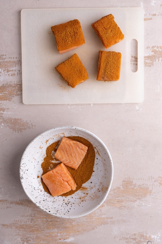 Slider-sized pieces of salmon coated in Cajun seasoning