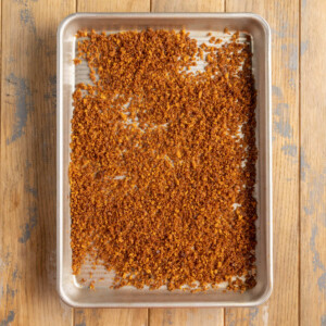 Golden brown toasted Panko breadcrumbs on a baking sheet