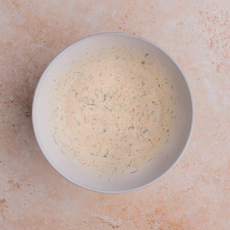 Bowl of creamy sauce for seafood pasta salad