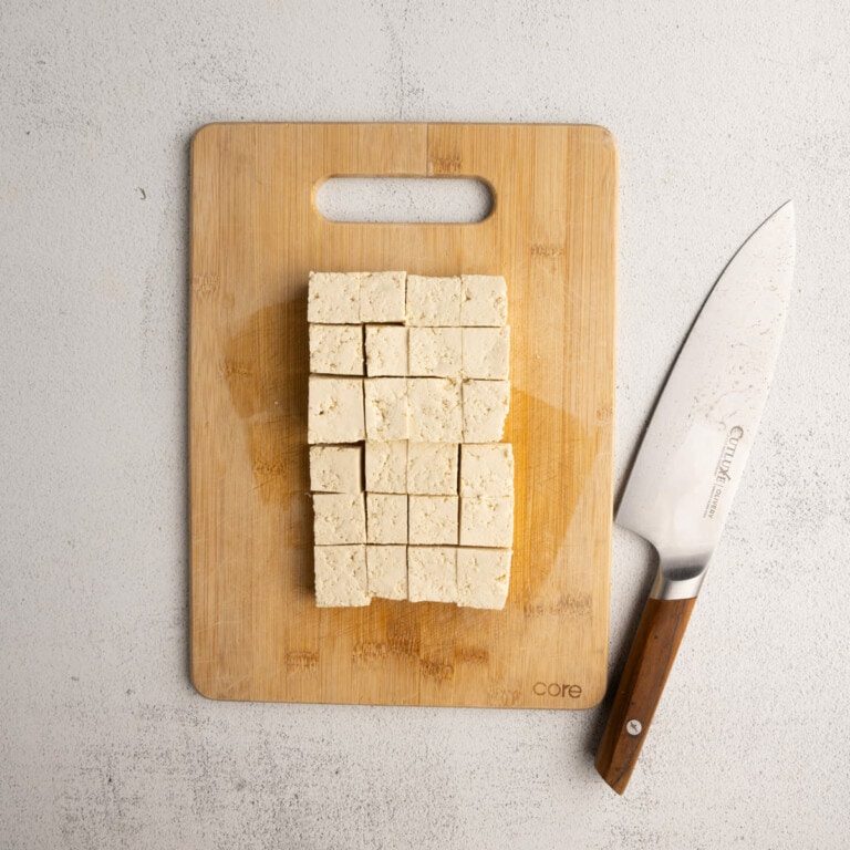 Tofu sliced into uniform bite-sized cubes