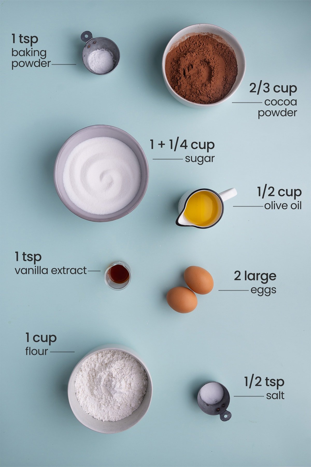 Ingredients for Olive Oil Brownies - baking powder, cocoa powder, sugar, olive oil, vanilla extract, eggs, flour, salt