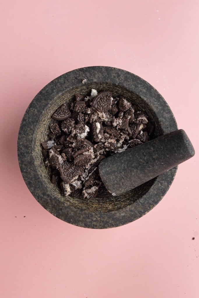 Crushing Oreos with Mortar and Pestle