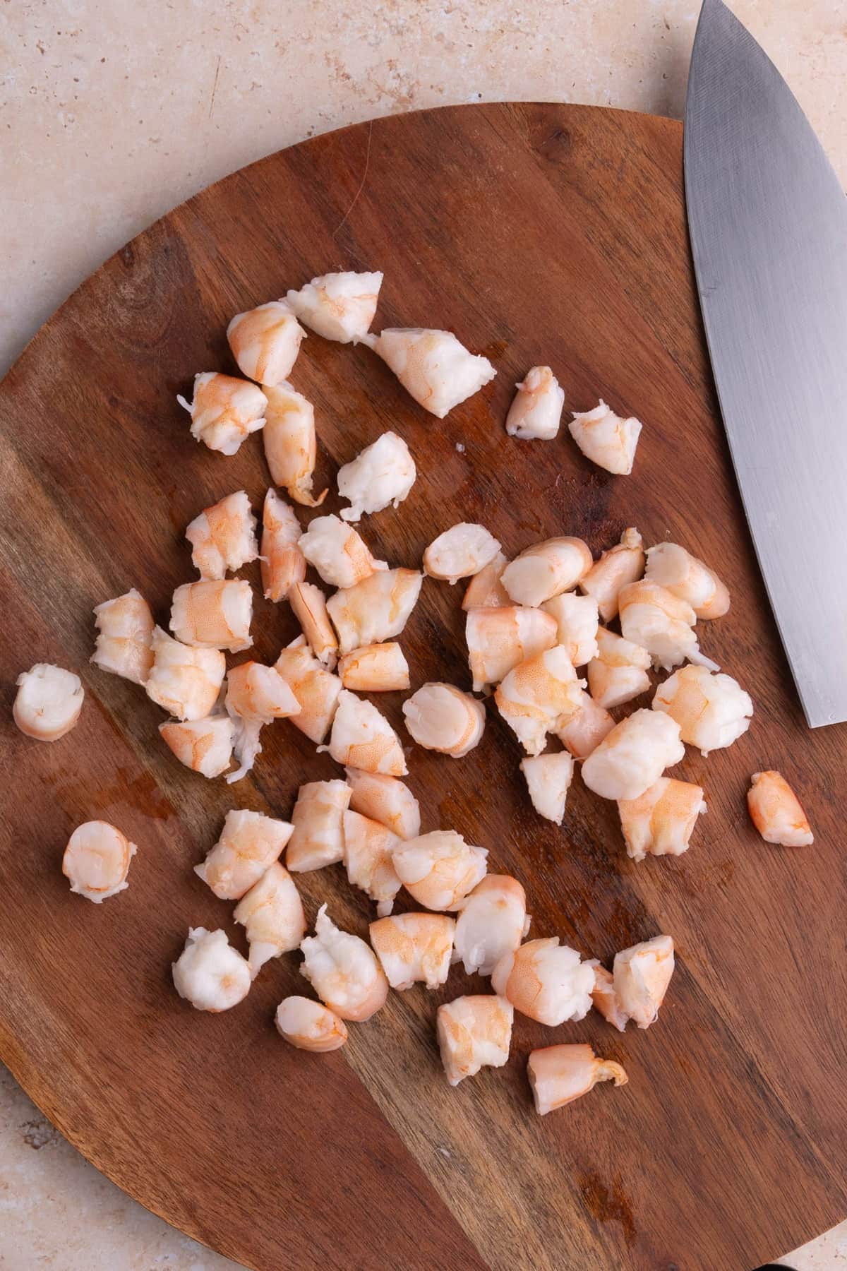 Peeled, cooked, and chopped shrimp ready to add to pasta salad