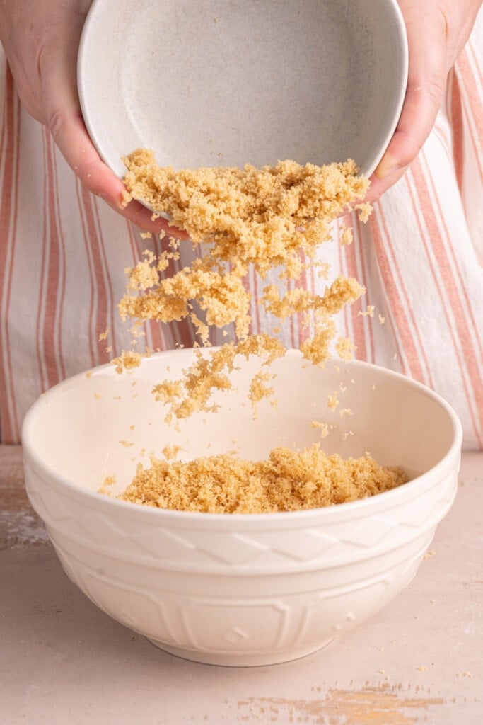 Adding light brown sugar to turtle cookie dough.