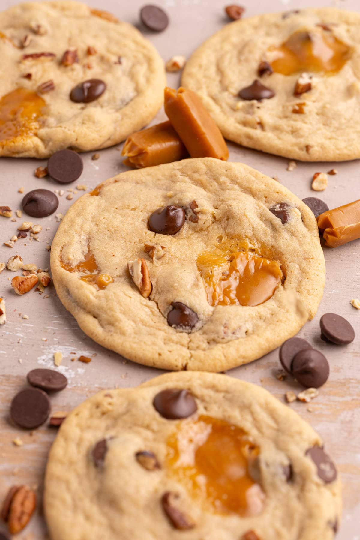 Turtle cookies with pools of caramel, crunchy pecans, and chocolate chips