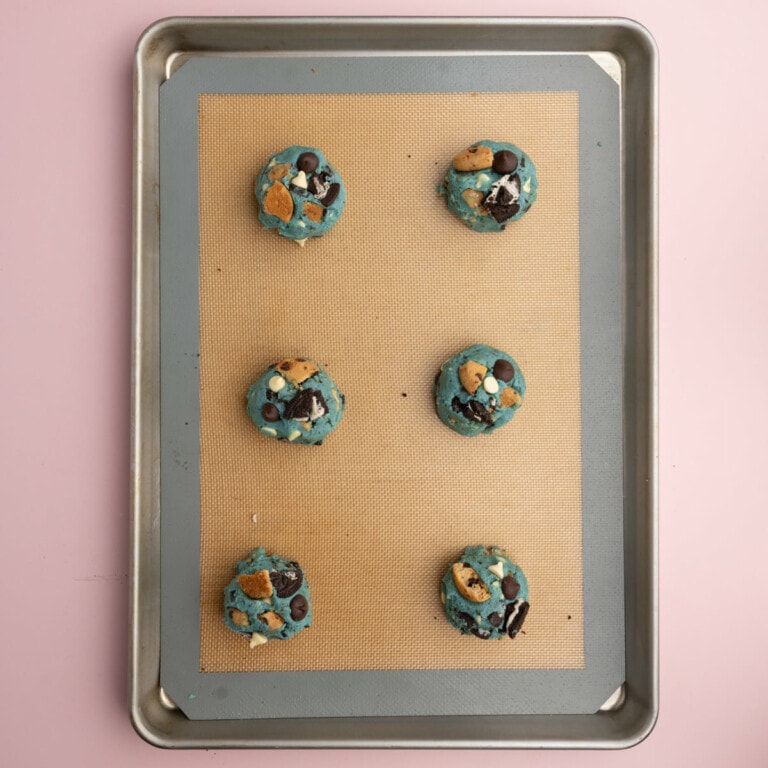 6 Cookie Monster cookies on a baking sheet