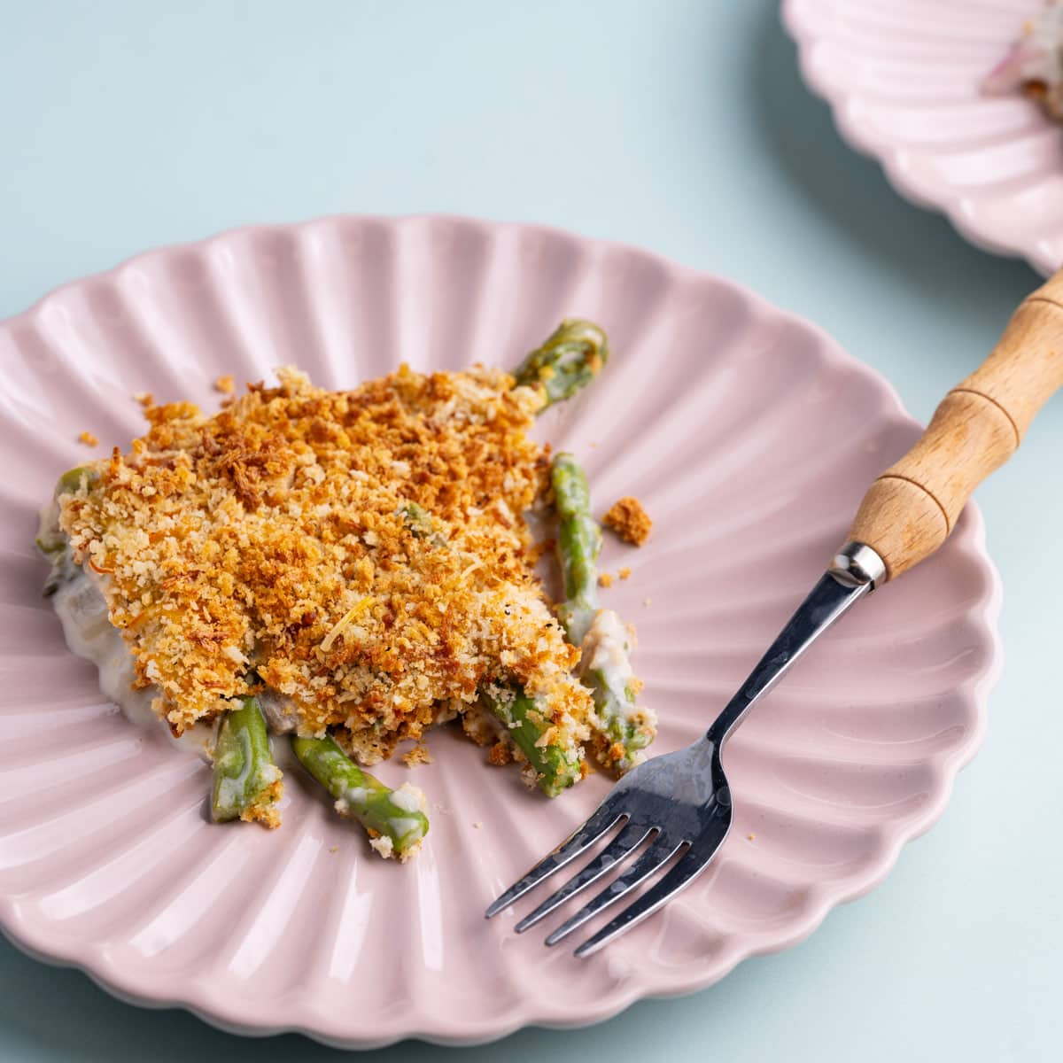 Serving of Asparagus Casserole on a pink plate