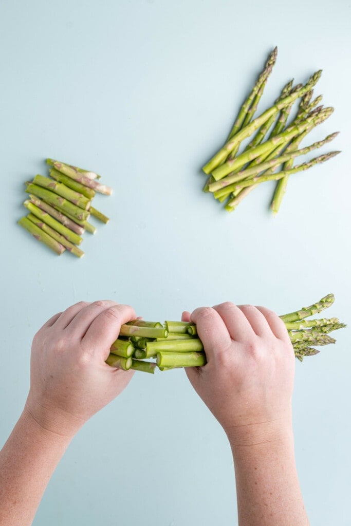 Snapping woody ends off asparagus