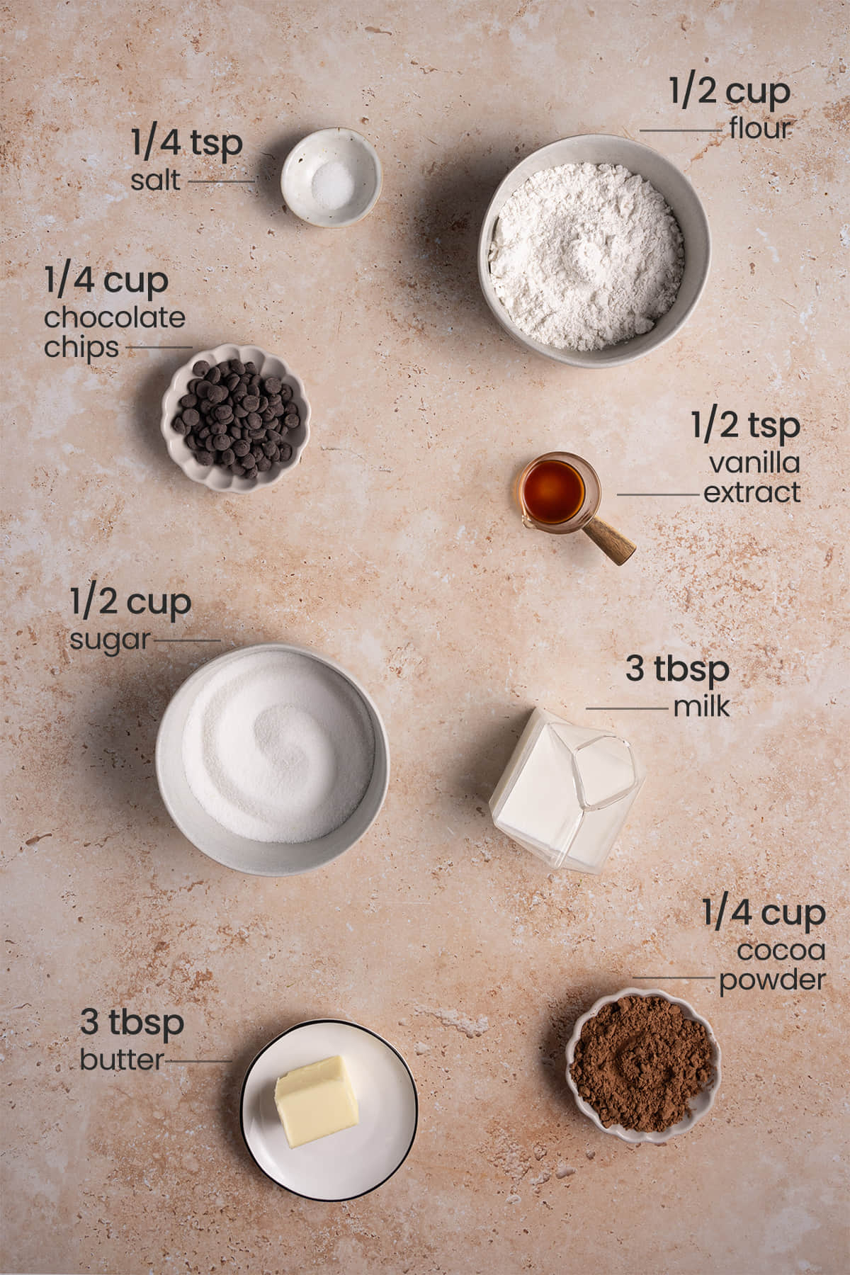 ingredients for edible brownie batter - salt, flour, chocolate chips, vanilla extract, sugar, milk, butter, cocoa powder