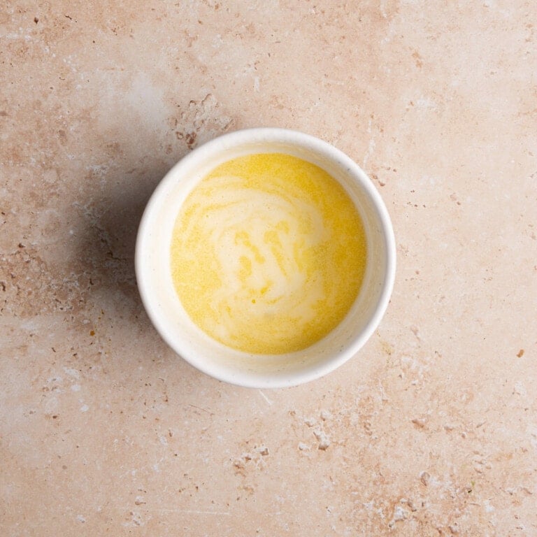 Melted butter in a small ramekin