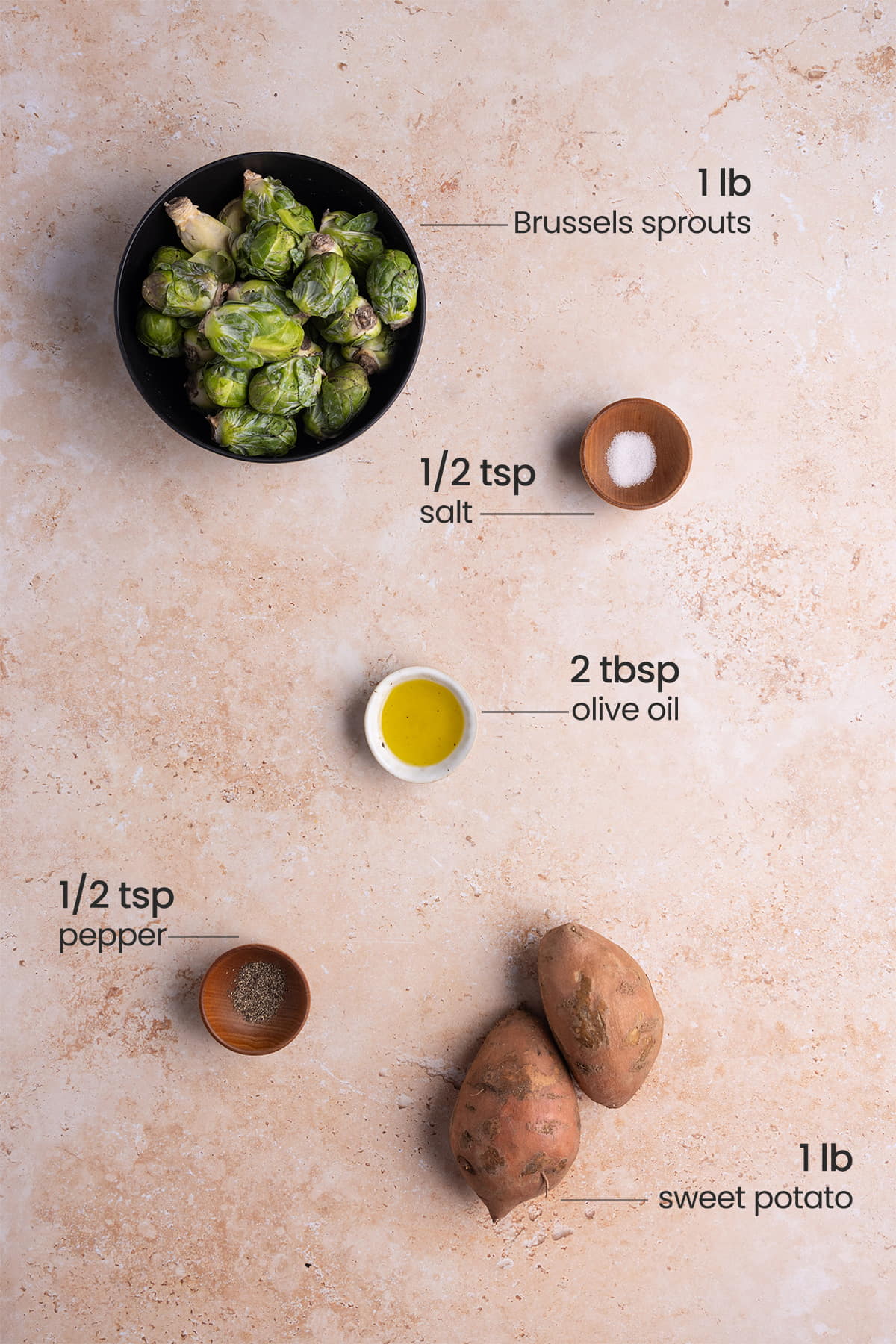 ingredients for roasted Brussels sprouts and sweet potatoes - Brussels sprouts, salt, olive oil, pepper, sweet potato