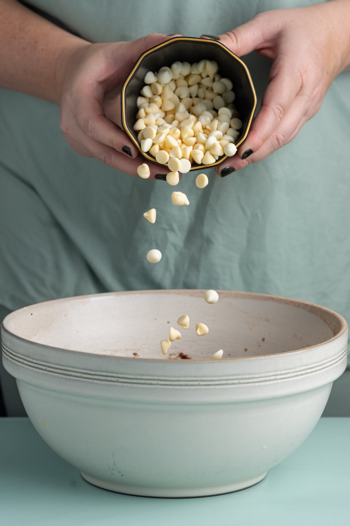 Adding white chocolate chips to cookie dough