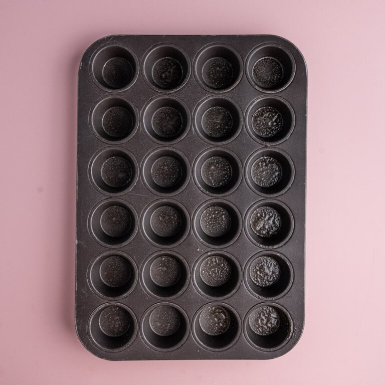 Mini muffin tin sprayed with oil so that brownie bites do not stick.