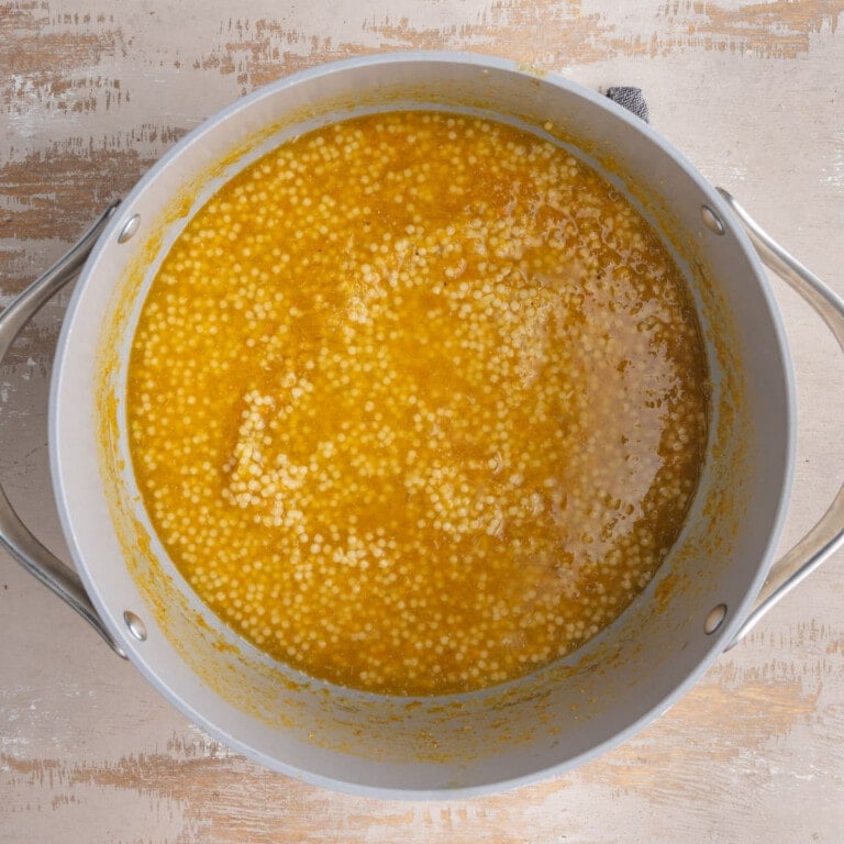 Pastina soup in a large pot.