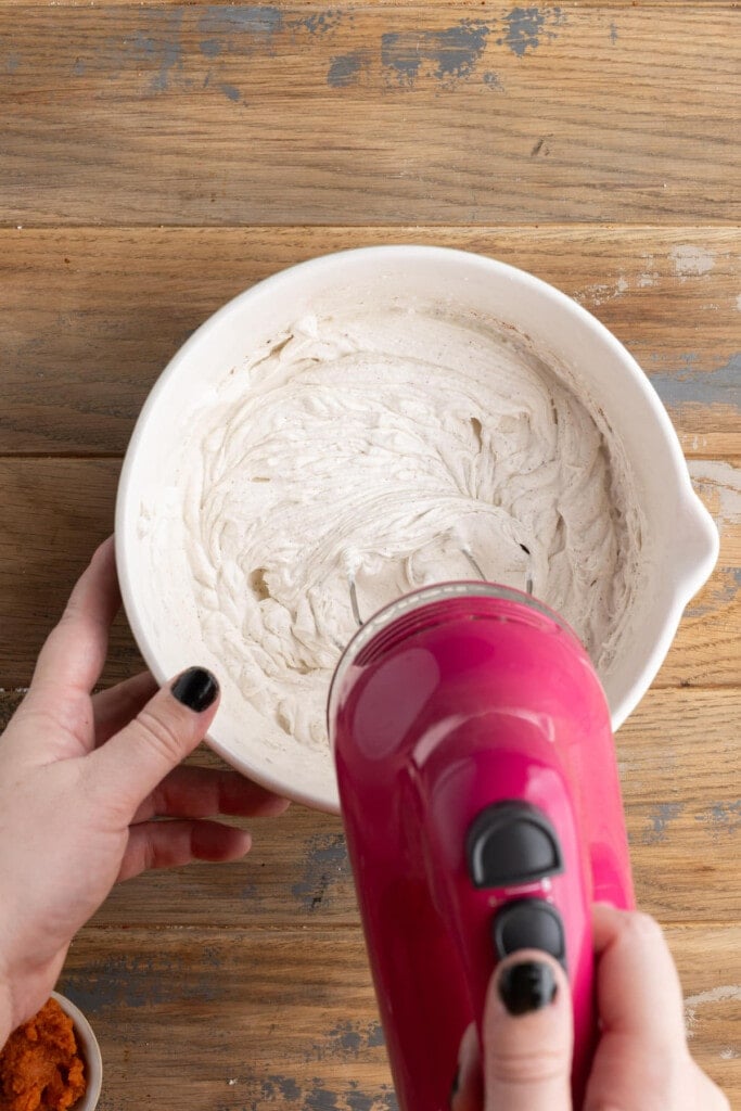 Using a hand mixer to whip heavy whipping cream