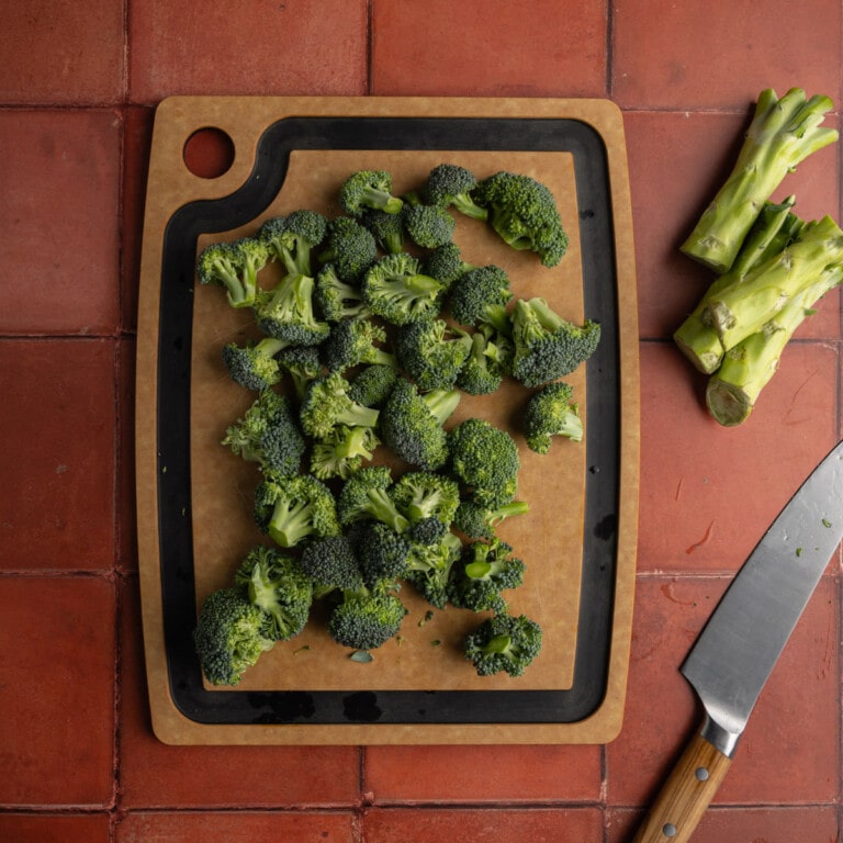 Florets chopped off broccoli head into bite-sized pieces.