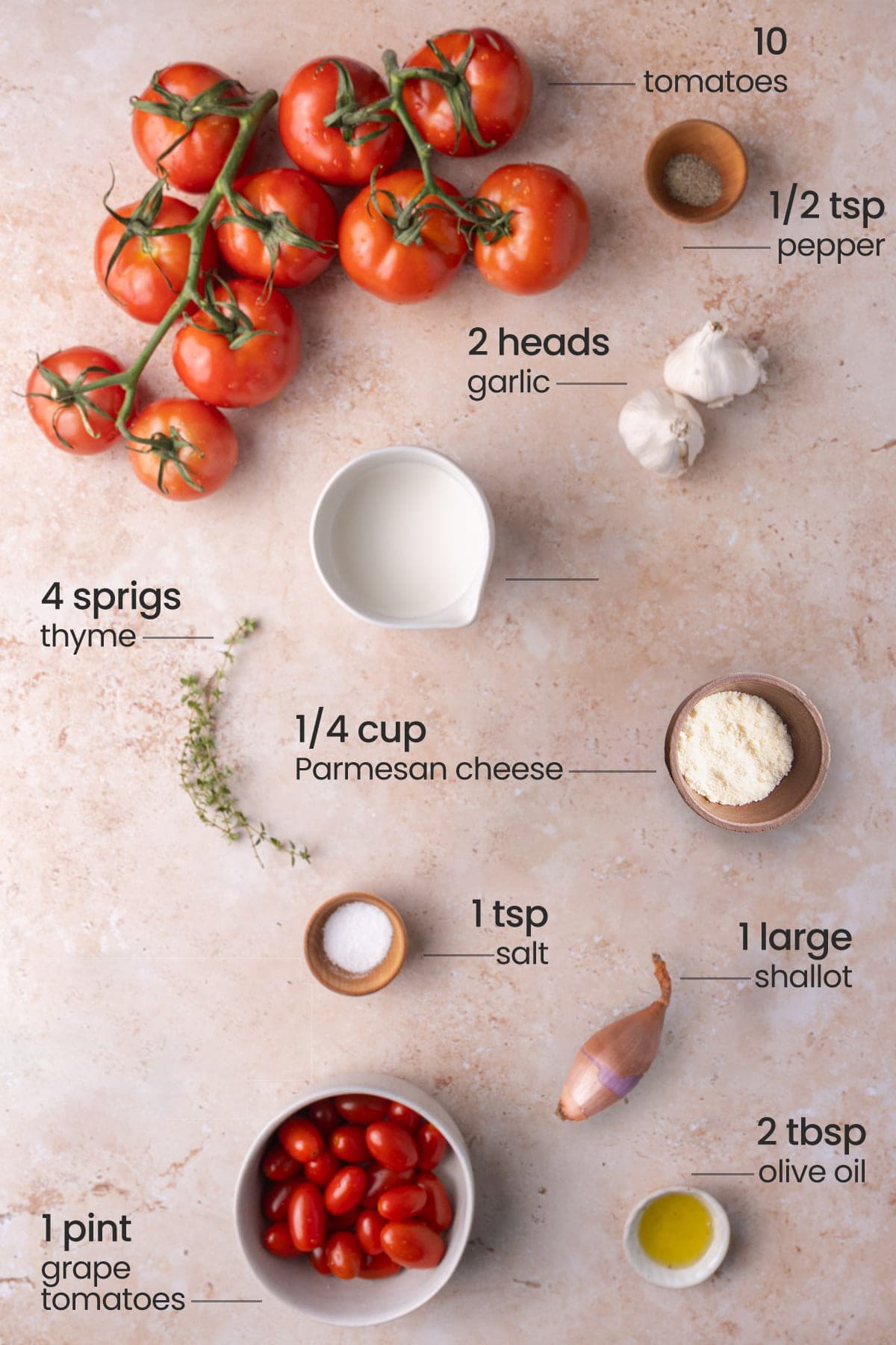 All ingredients for Roasted Garlic Tomato Soup - tomatoes, pepper, garlic, thyme, Parmesan cheese, salt, shallot, olive oil, grape tomatoes