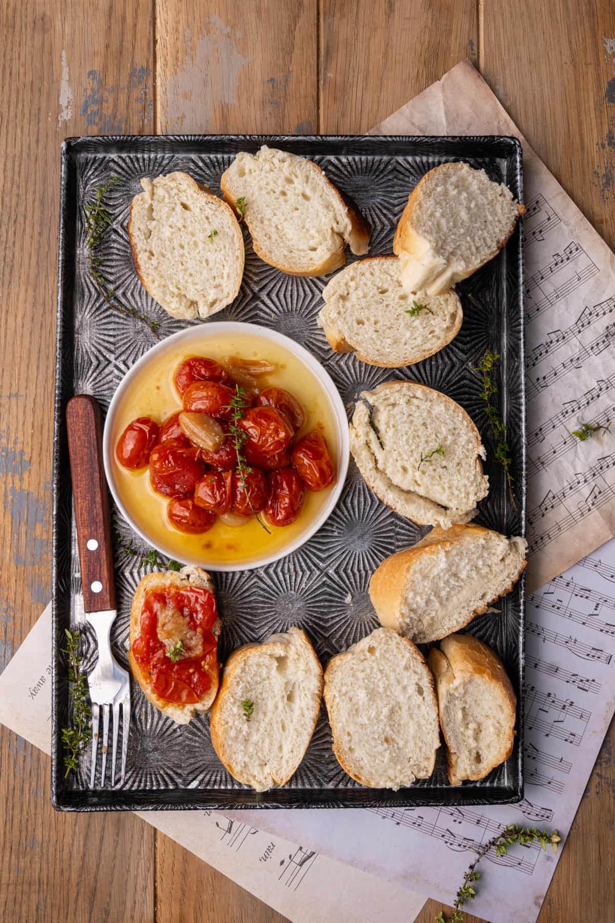 Tomato Confit spread on a slice of bread. 