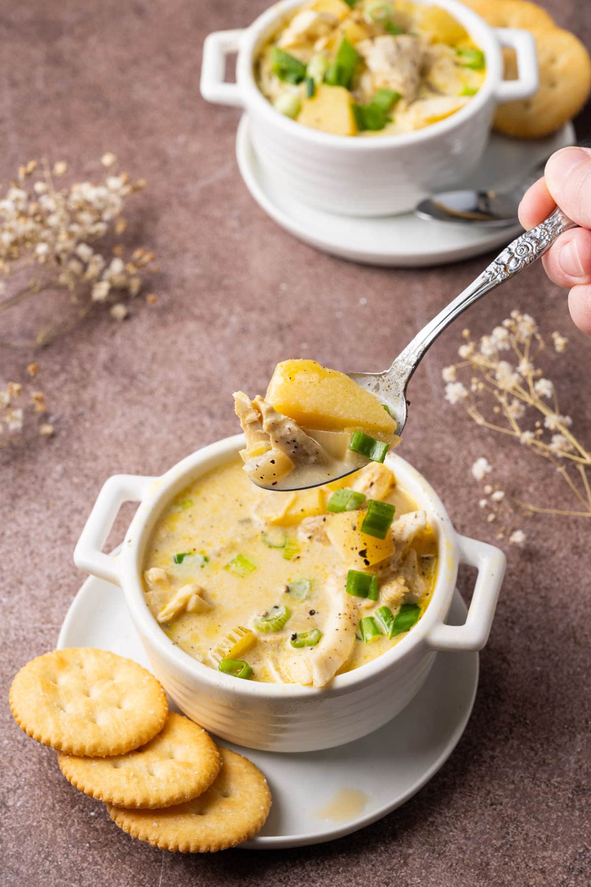 Grabbing a spoonful of one pot halibut chowder. 
