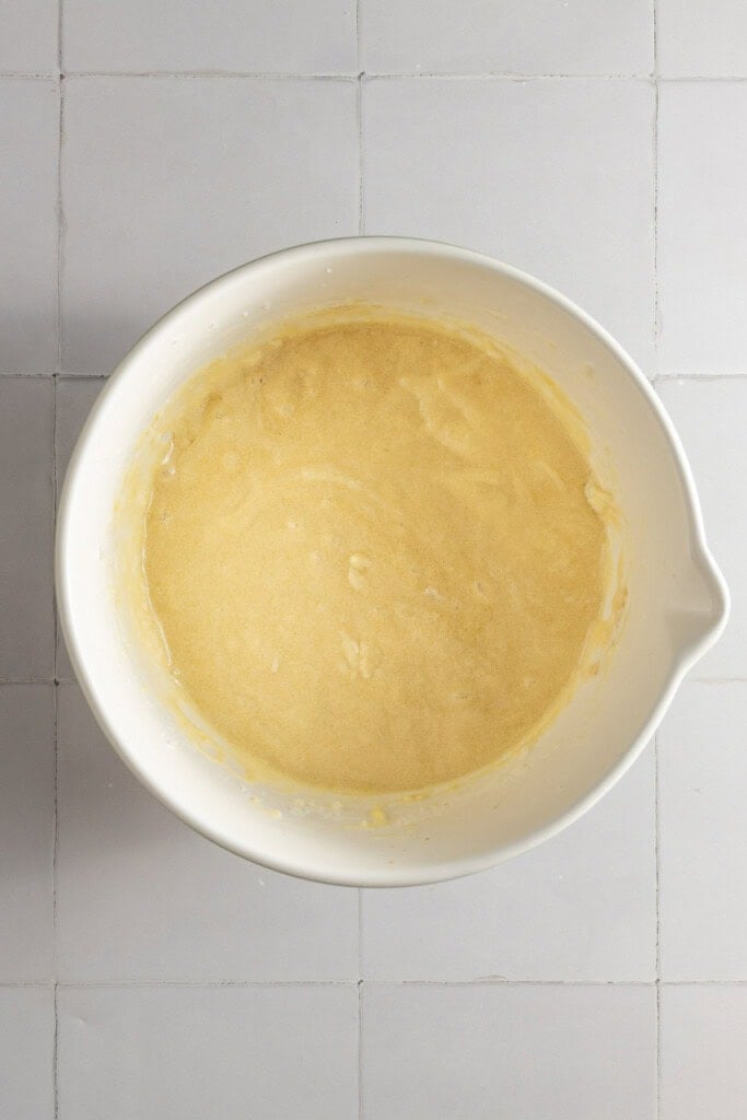 Creamed butter, oil, and sugar mixed with eggs and vanilla extract.