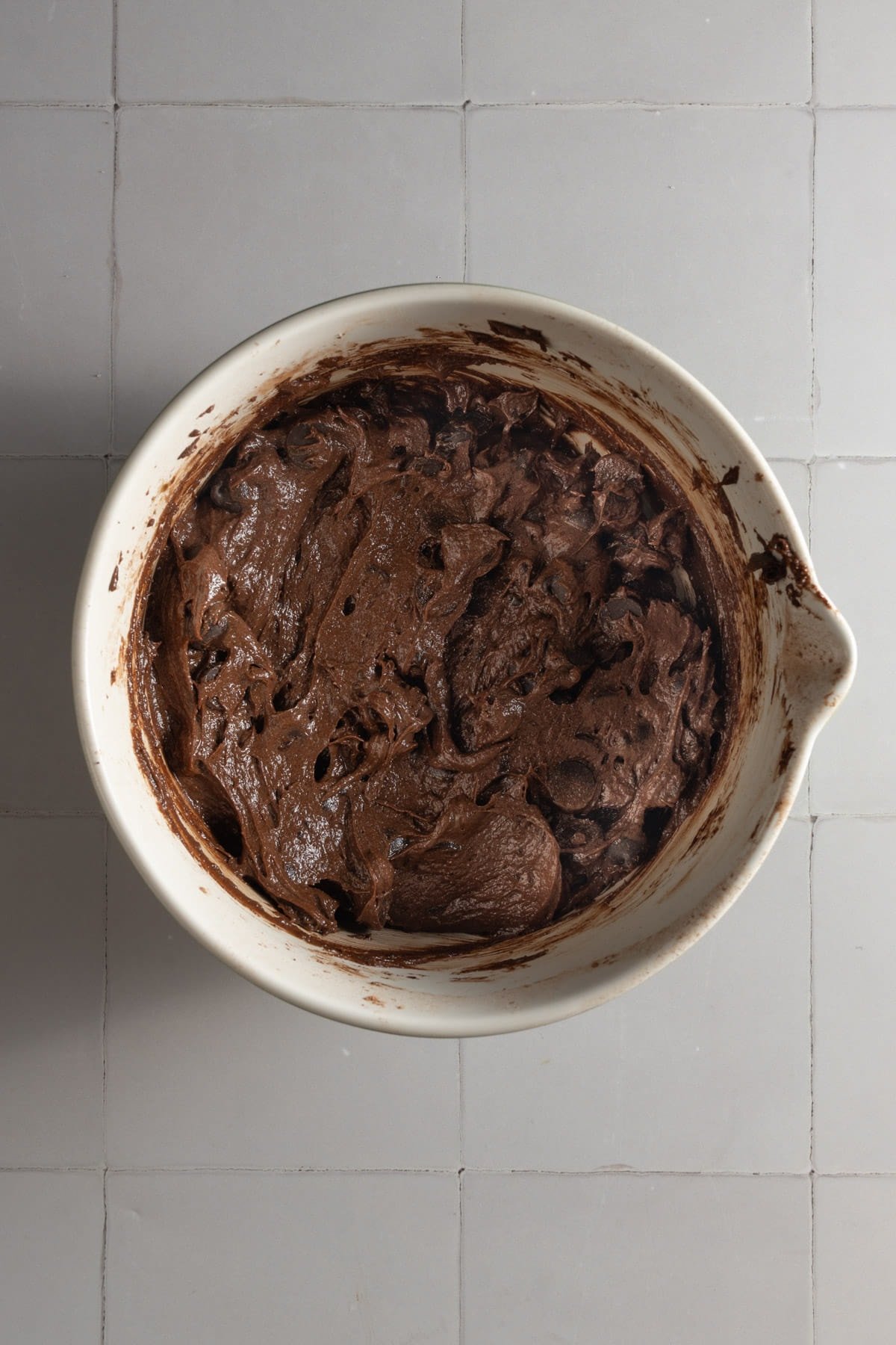 Chocolate chip brownie batter ready to transfer to prepped pan. 