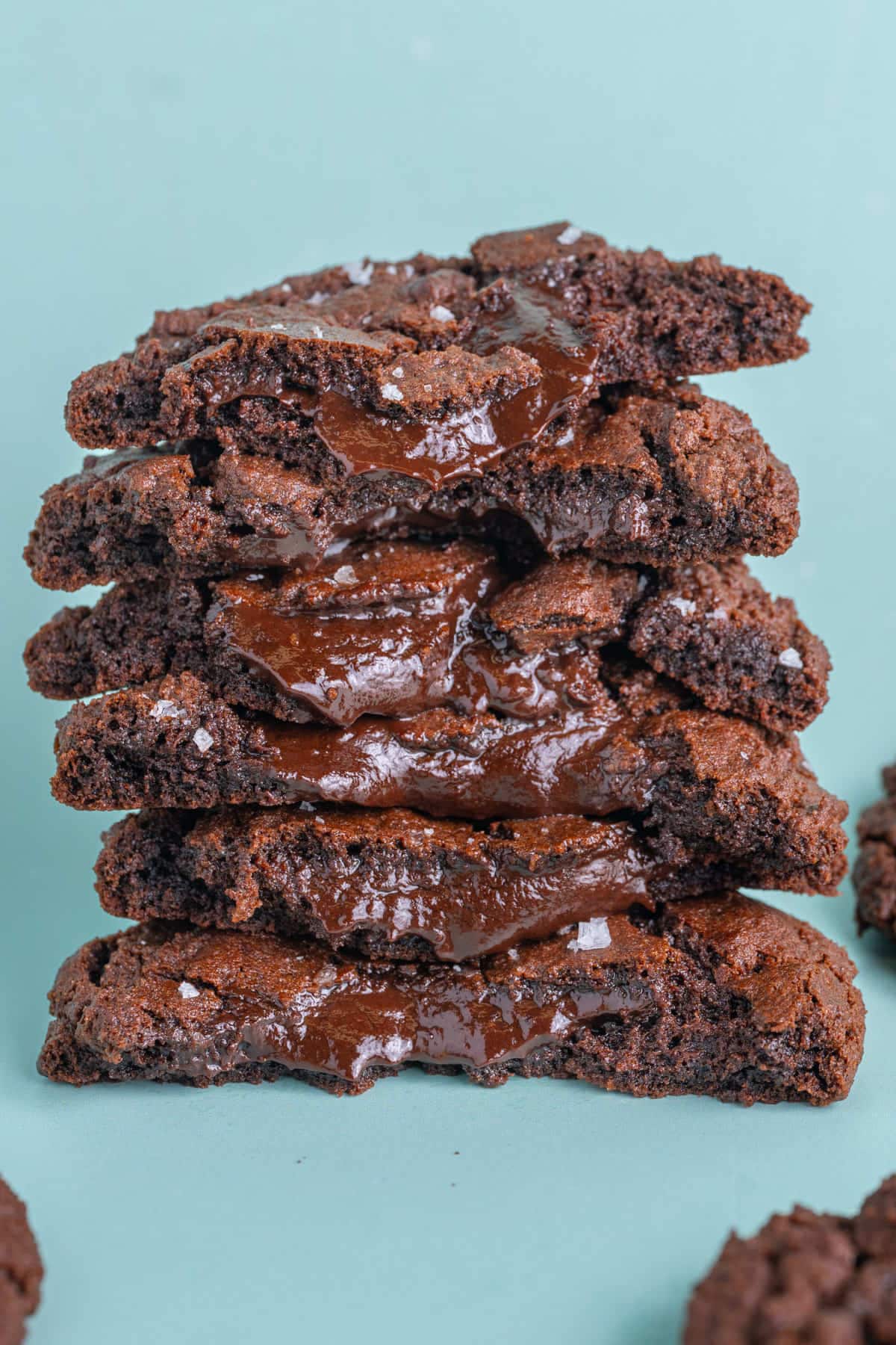 Molten chocolate fudge cookies stacked on top of one another. 