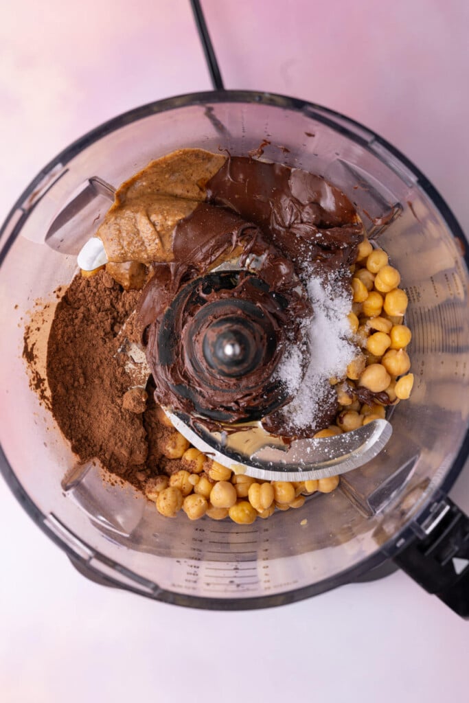 Chickpeas, melted chocolate, almond butter, cocoa powder, and salt in a food processor.