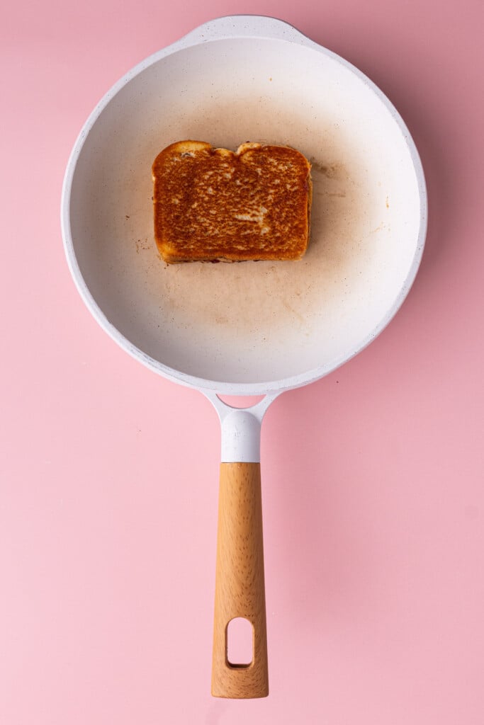PB&J with golden brown pan-fried bread on the outside.