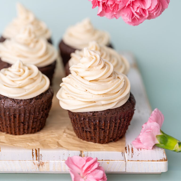 Chocolate cupcakes with generous piping of Irish Cream Buttercream on top.