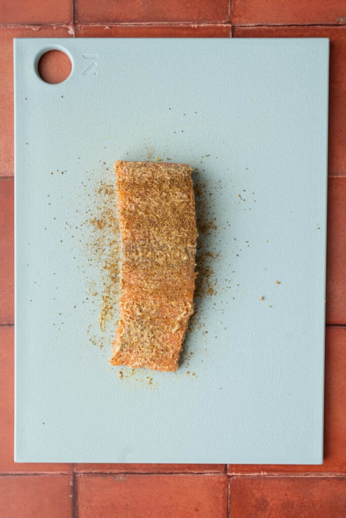 Skinless salmon with Dijon mustard and Old Bay seasoning on both sides. 