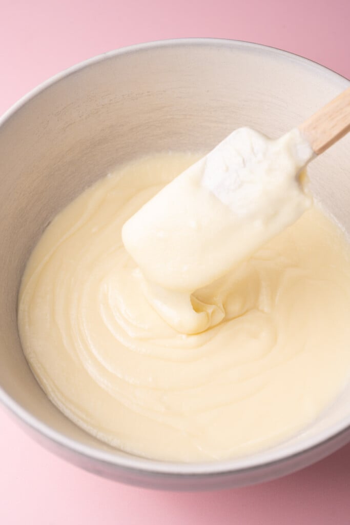 Ganache that has been sitting at room temperature to thicken into a spreadable frosting. 