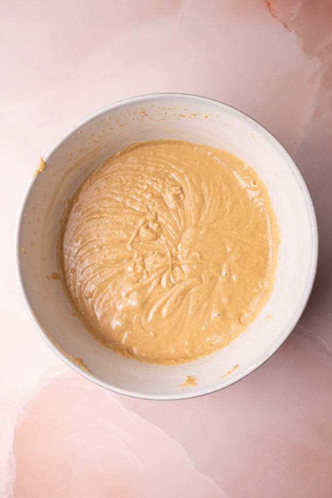 Peanut butter sheet cake batter in a large mixing bowl. 