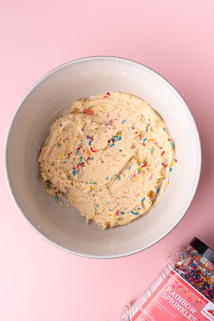 Sugar cookie dough with rainbow sprinkles folded in.