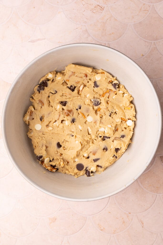 Cookie dough packed with white and dark chocolate chips, caramels, and pretzels. 
