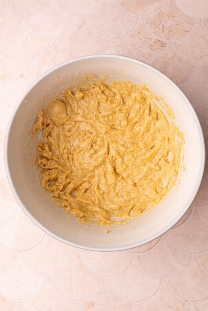 Egg and vanilla extract mixed in to creamed butter and sugar in a large mixing bowl. 
